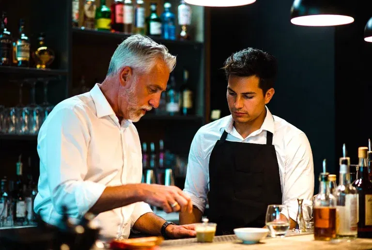 Bartender checking ID